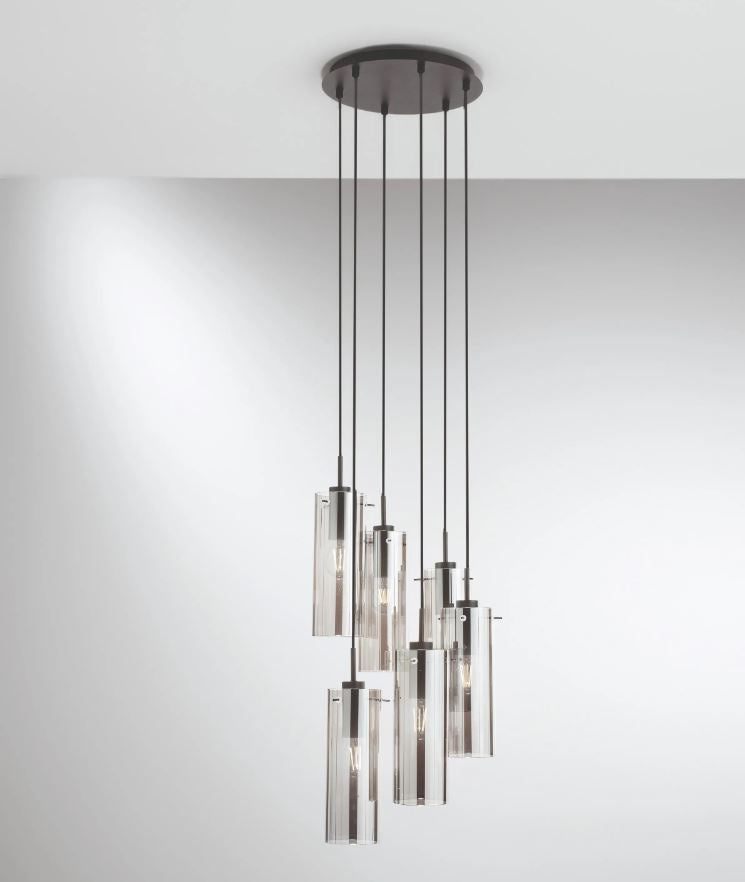 Sosp.6 luci forme cilindriche in metallo nero con vetro fumè o metallo oro con vetro ambra 6XE27 non incl. MAGIC Sosp.6 luci forme cilindriche in metallo nero con vetro fumè o metallo oro con vetro ambra 6XE27 non incl. MAGIC